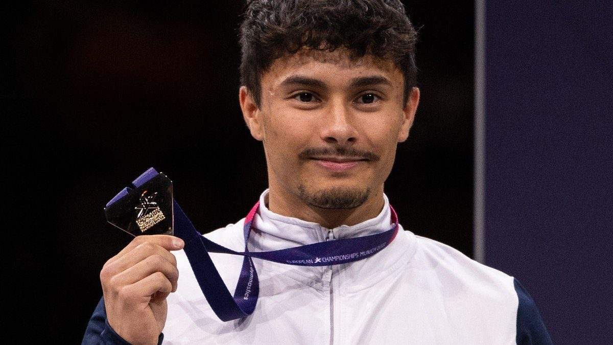 Jake Jarman of Great Britain with his medal at the 2022 European Championships (file photo)