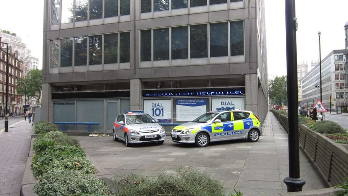 Police cars at New Scotland Yard, headquarters of the Metropolitan Police — detective Linda Williams is calling for Commissioner Sir Mark Rowley to resign