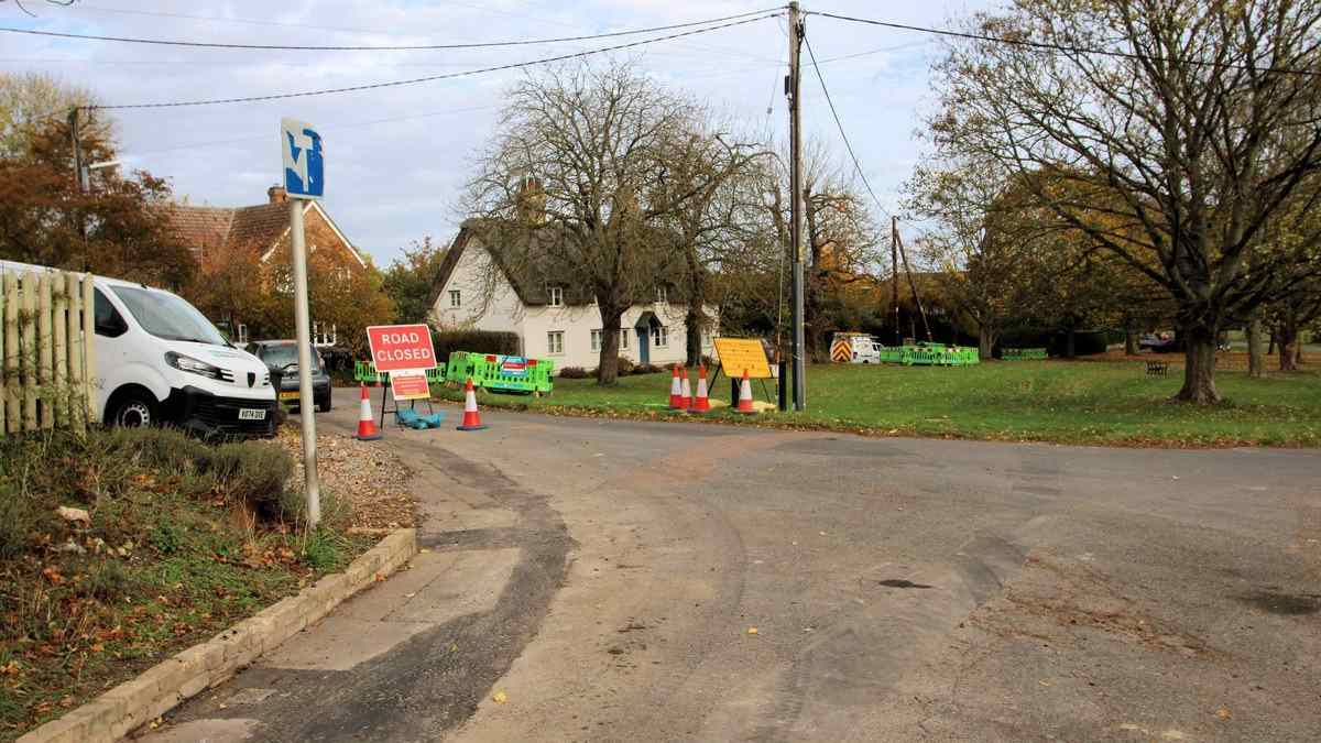 Fibre optic cable installation in progress on a UK street