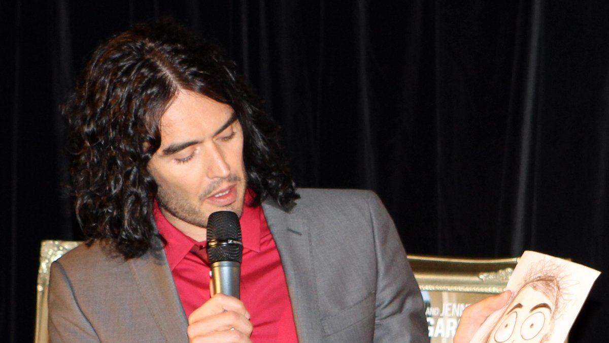 Russell Brand Called a 'Ruthless Sexual Predator' as Rape Trial Opens at Southwark Crown Court
