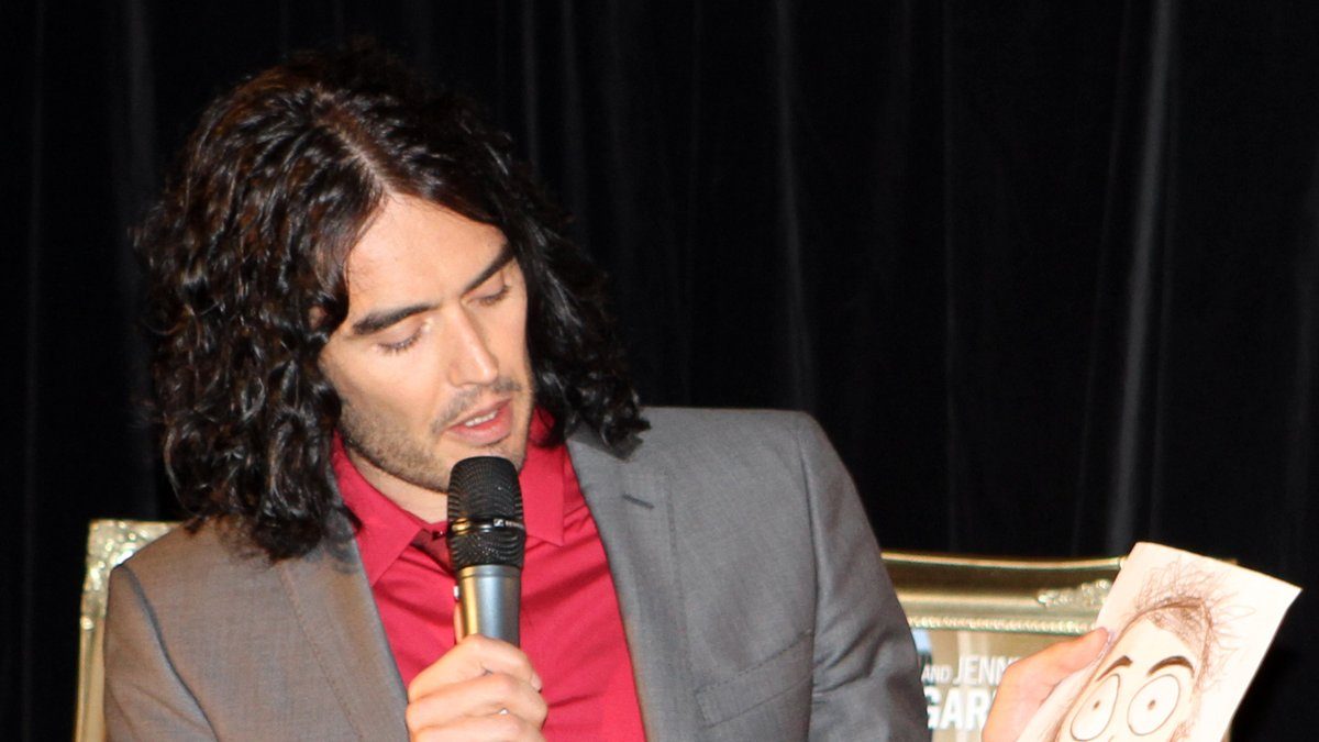 Russell Brand Called a 'Ruthless Sexual Predator' as Rape Trial Opens at Southwark Crown Court