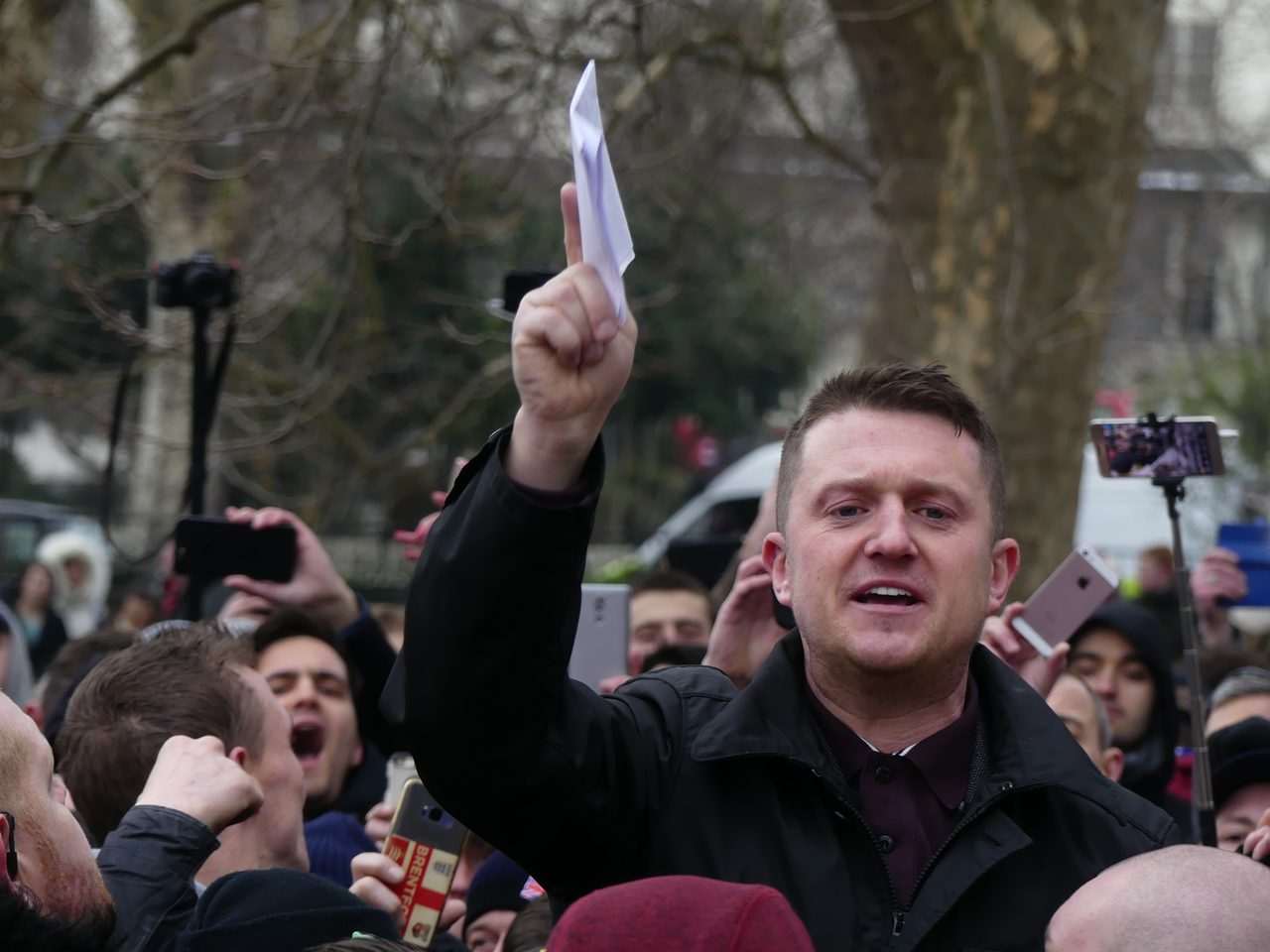 Tommy Robinson at Speakers' Corner, Hyde Park — his harassment trial opened at Southwark Crown Court on 19 October 2026